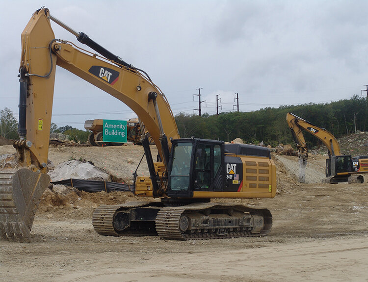 Heavy machinery in vacant lot