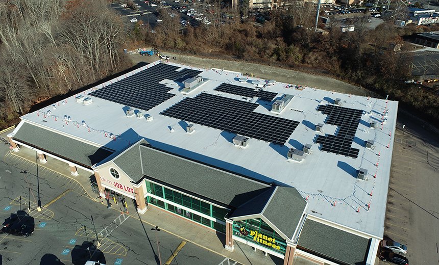 Solar panels installed on top of commercial building
