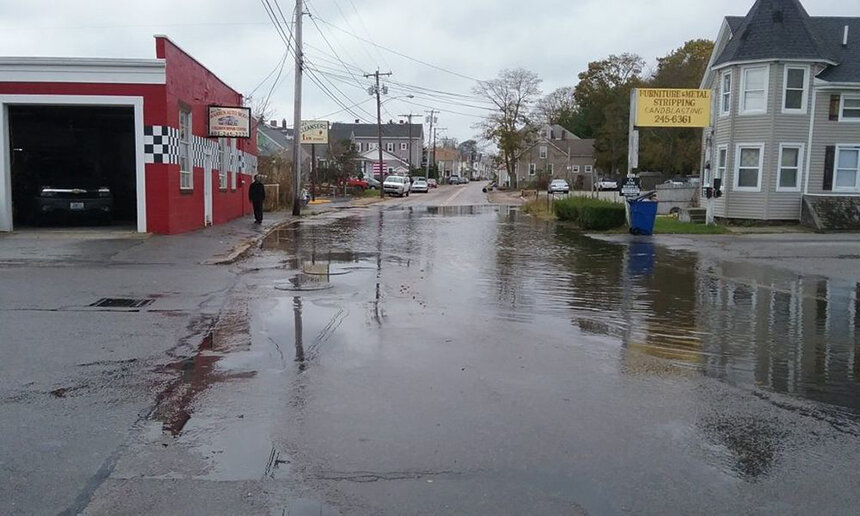 Overflooded street with buildings on each side