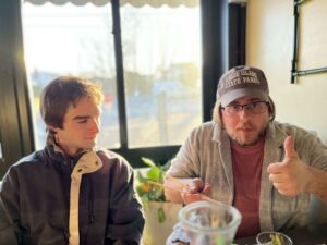 two young men at the table
